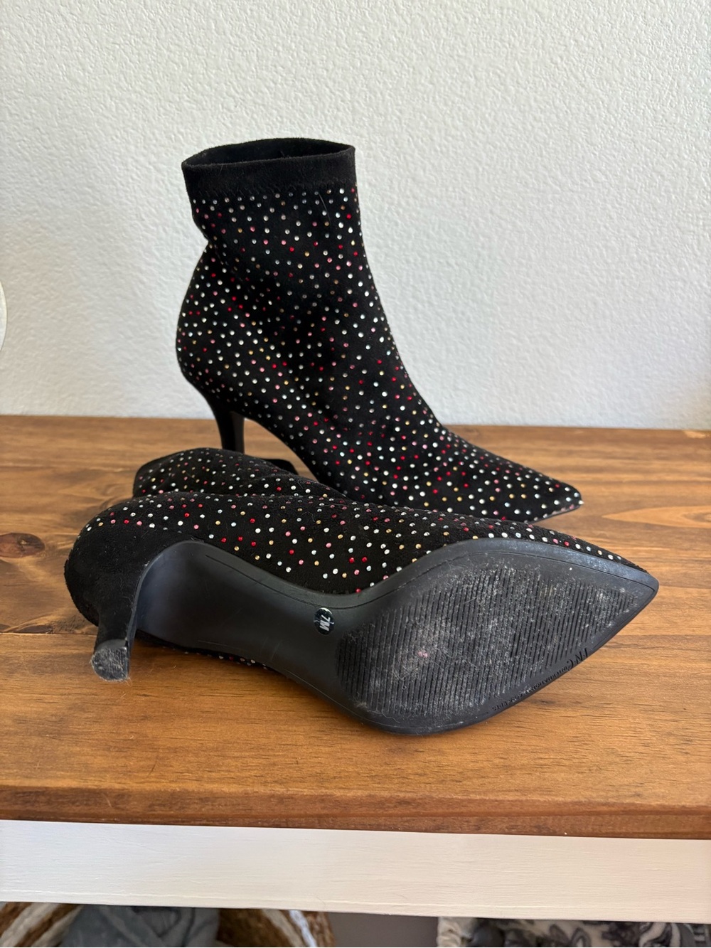 Black ankle booties with color rhinestones. Gently used.